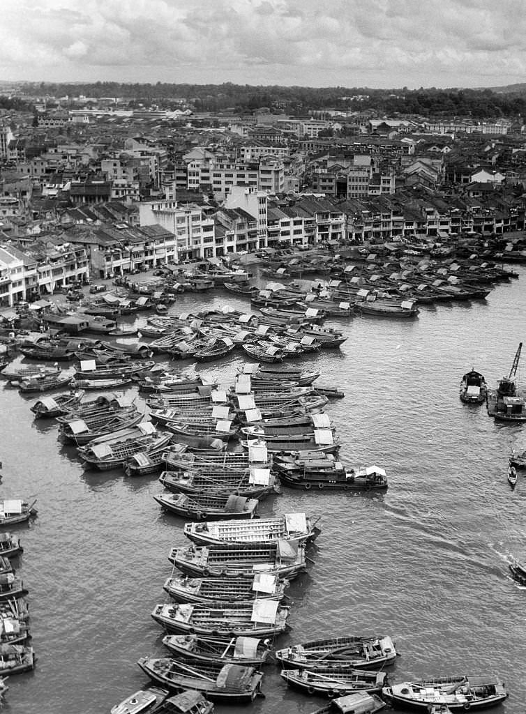 View of the Singapore River, transhipment point for freight, 1960