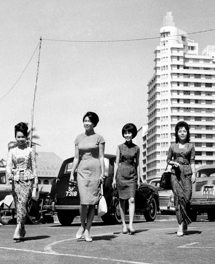 Elegant women in a central street, Singapore, 1968.