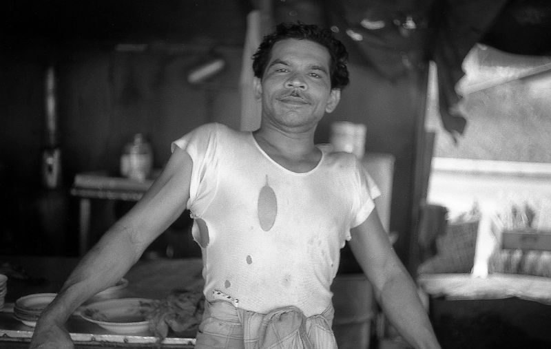 One of the stallholders on the food stalls at Sembawang village, 1960s