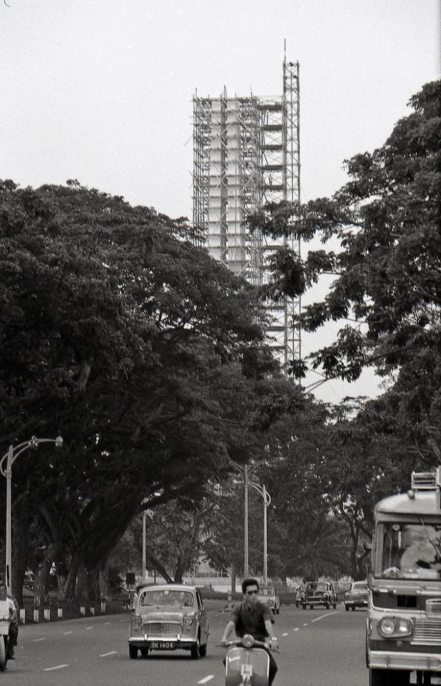 The 'chopsticks' civilian war memorial being constructed, 1960s