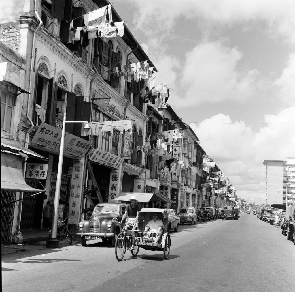 Scenes in Chinatown, Singapore, Upper Hokien Street, where old meets new, 1962