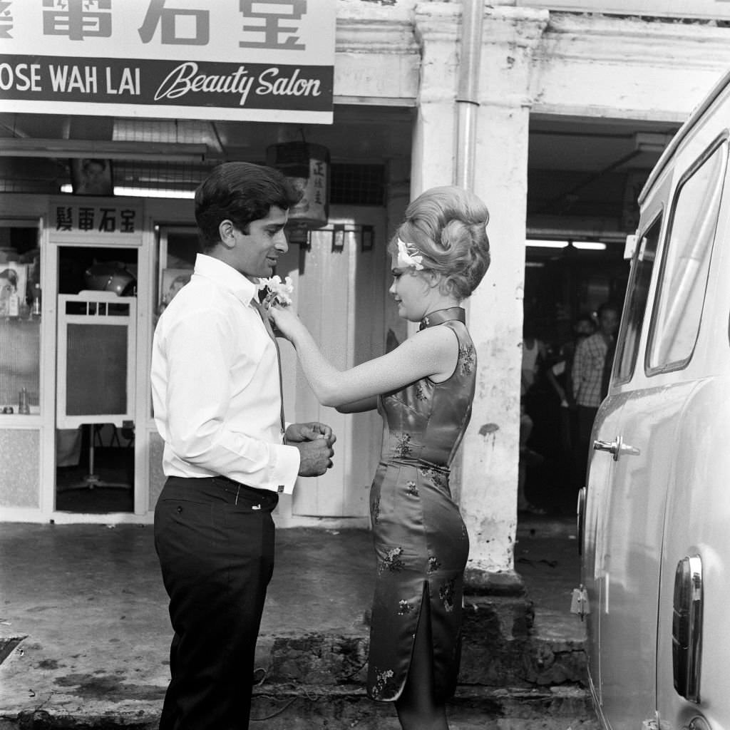 A new-look Hayley Mills in Chinese Make-up and a cheongsam on location in Singapore, for her new film 'Pretty Polly', 1967