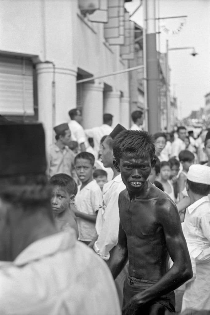 Boy in the streets of Singapore, 1962