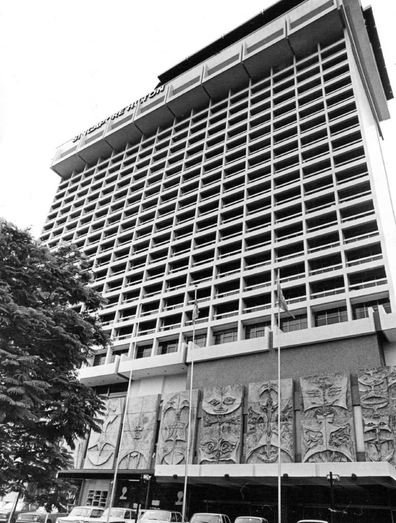 Typical of the deluxe hotels springing up in Singapore is the new Singapore Hilton, 1971
