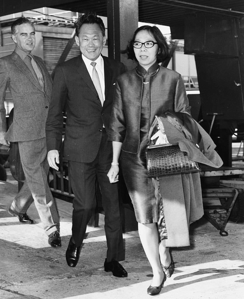 Lee Kuan Yew, Prime Minister of Singapore, leaving Heathrow Airport with his wife, 1970