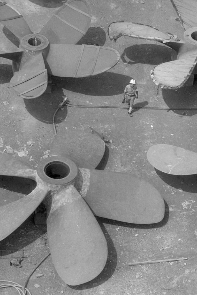 Boat propellers at a shipyard in Singapore, July 1974.