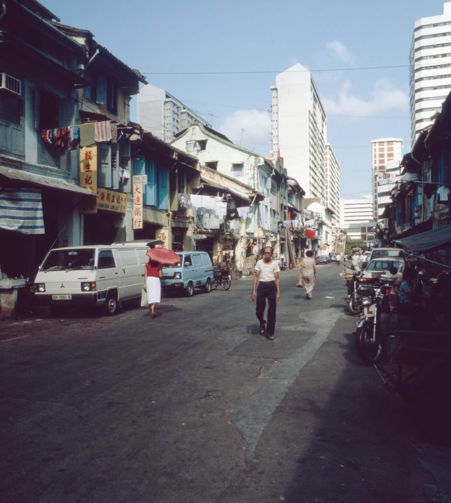 On the way in the streets of Chinatown in Singapore, 1980s.