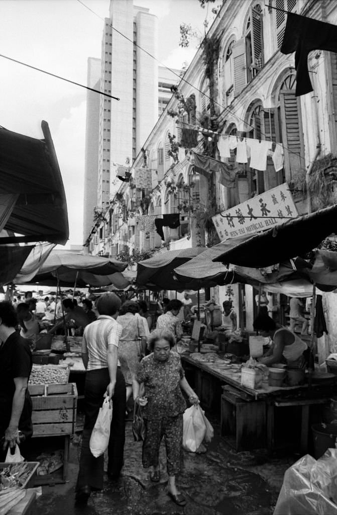 Sago Street market enjoys a final few weeks of authentic living heritage in Singapore's bustling Chinatown before falling victim to urban renewal, 1983.