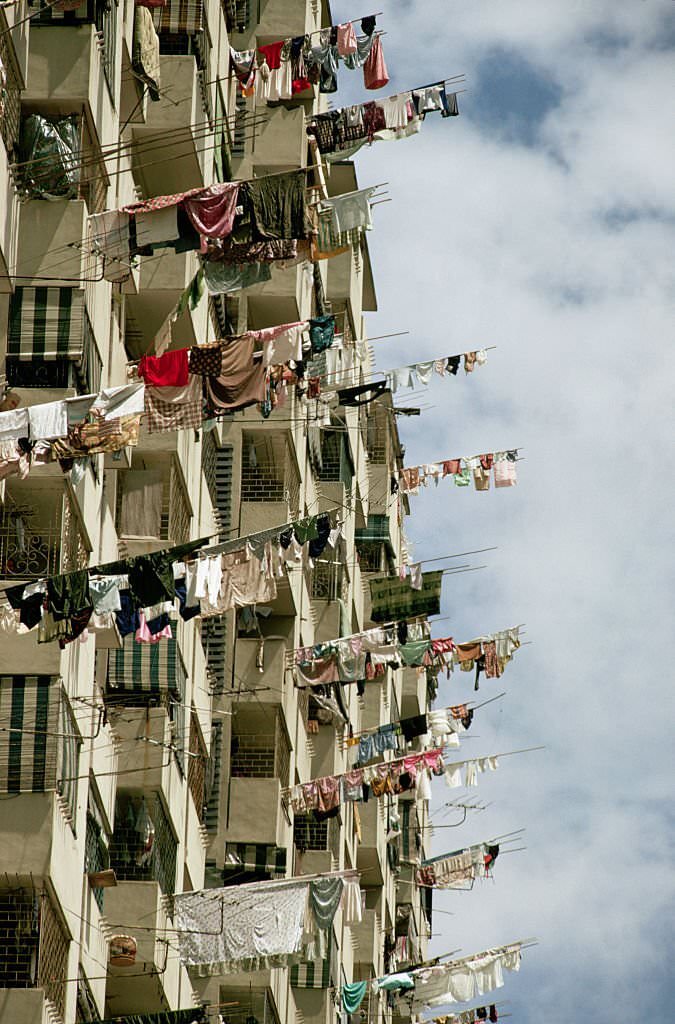 Laundry hangs out to dry on apartment balconies in Singapore, 1980s