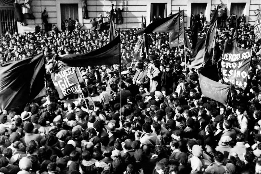 Demonstrators hold banners calling for the death of Gil Robles, the leader of the rightist party CEDA, in Madrid after the Frente Popular's victory at the February 1936 parliamentary elections.