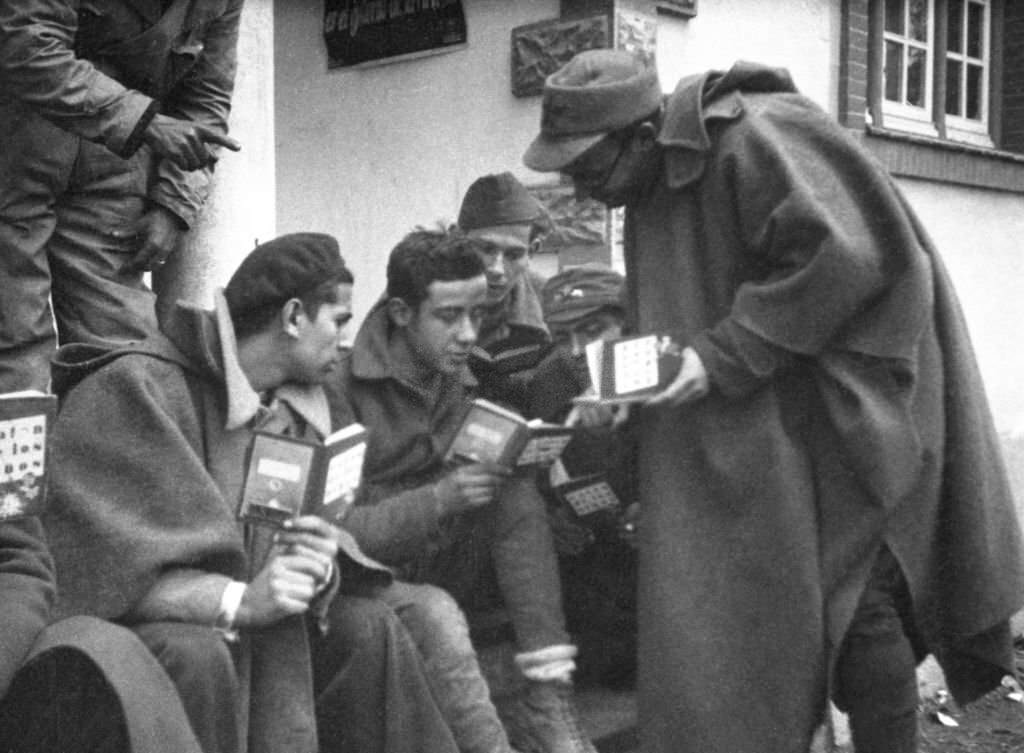 Republican militiamen learning to read in Madrid during the Spanish Civil War, March 1937.