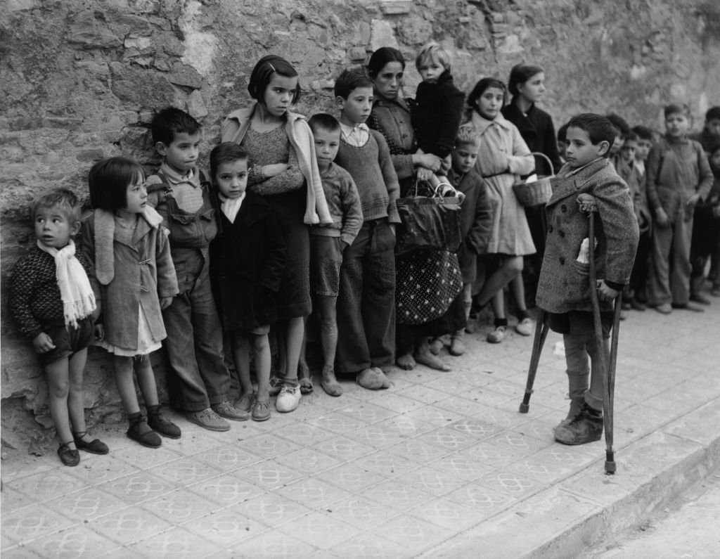Children queuing for milk rations, Spanish Civil War (1936-1939), December 1937
