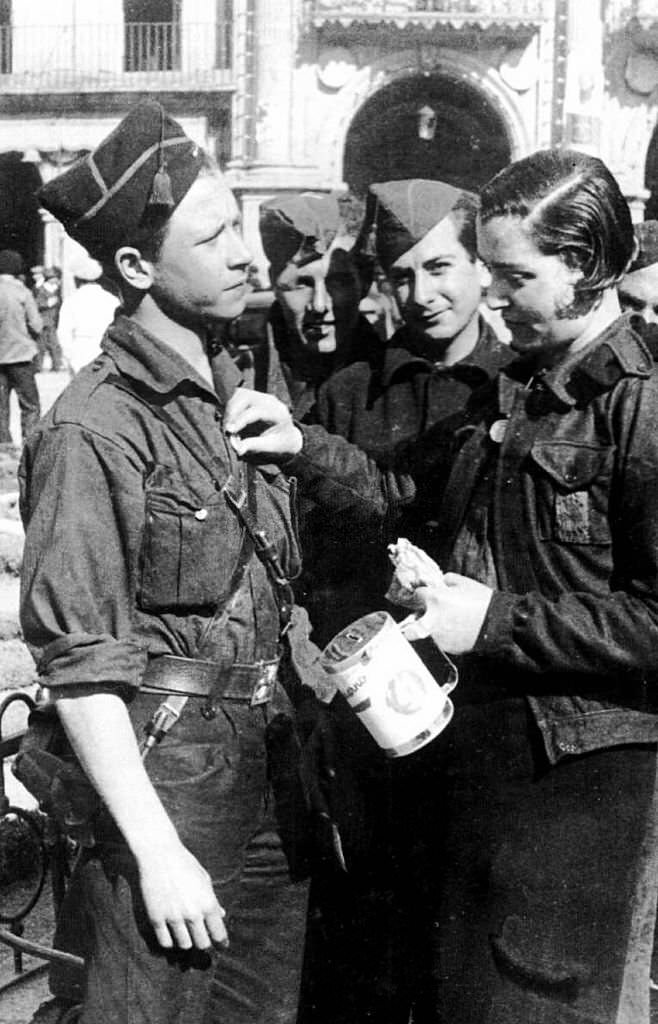 Woman collecting funds for the Nationalist (pro-Franco) forces, in Salamanca during the Spanish Civil War, 1937.