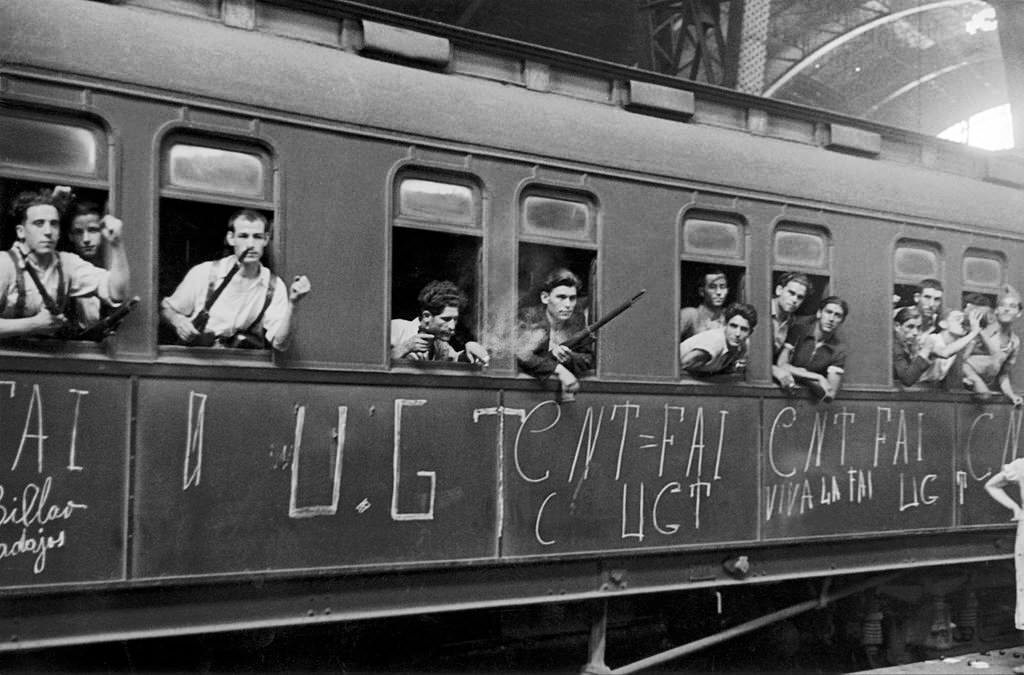 Madrilene Workers volunteering in the Spanish Republican Army leaving for the Front During The Civil War, 1936.
