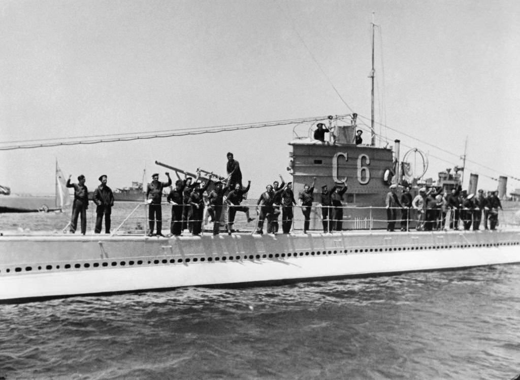 Members of the Navy who remained loyal to the Republic are seen standing on a C6 submarine a few days after the coups in 1936.