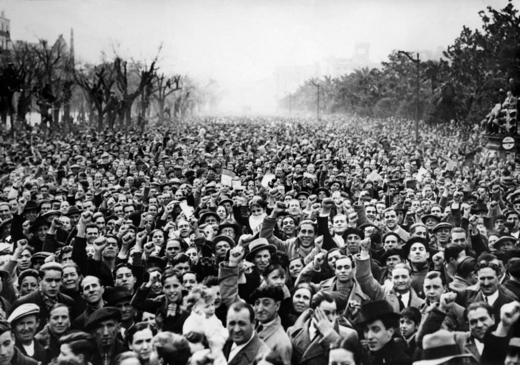 Thousands of Republicans demonstrating in the streets of Madrid against Franco's attempt to overthrow the Spanish Republic.