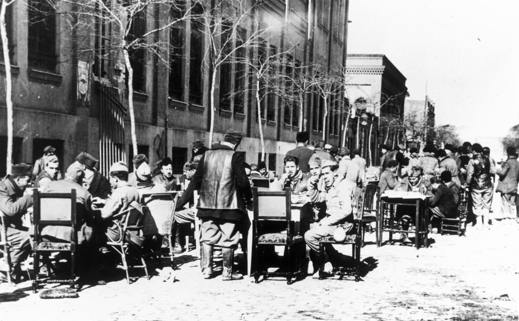 Government militiamen having lunch behind the front lines, Spain, 1937