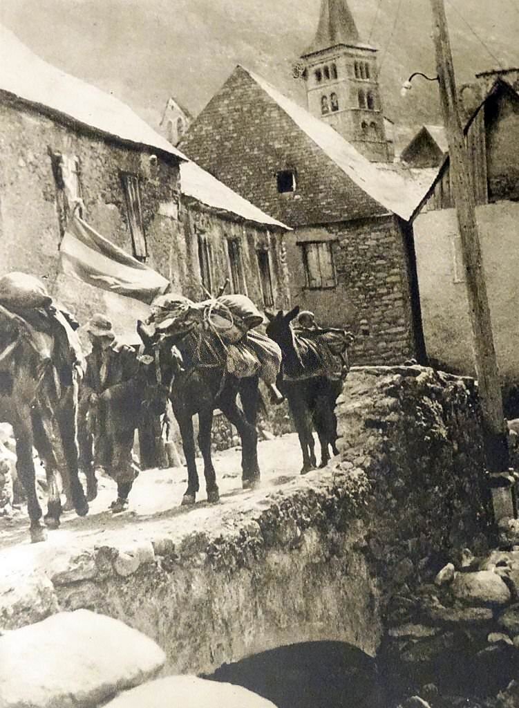 Republican soldiers pass through a village in Spain, during the Spanish Civil War.