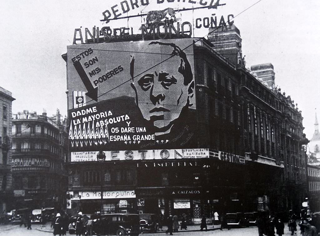 Poster on a Madrid building depicts José María Gil-Robles y a prominent Spanish politician in the period leading up to the Spanish Civil War, speaks in Parliament in 1936.