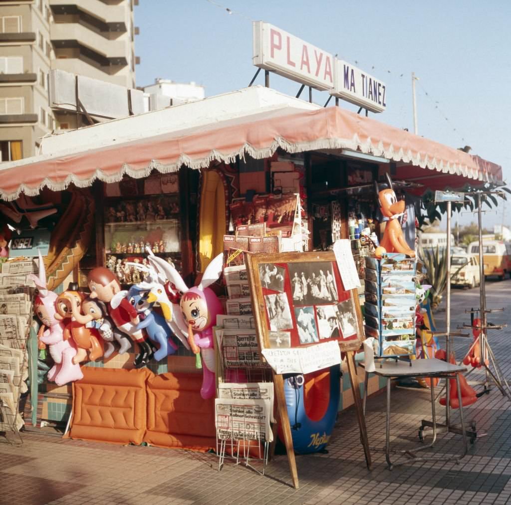 A newspaper shop in front of a big hotel on the island of Tenerife, Canary Islands 1975.