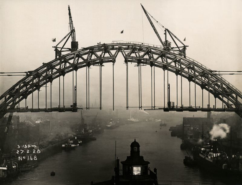 Flags fly above the Tyne Bridge to celebrate the completion of its arch, February 27, 1928