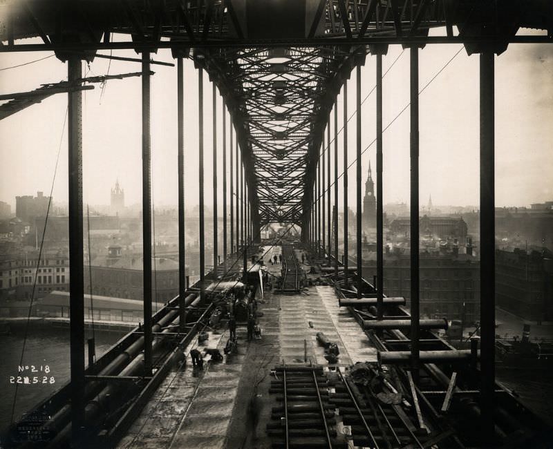 View along the Tyne Bridge towards Newcastle, as work continues on its roadway, May 22, 1928