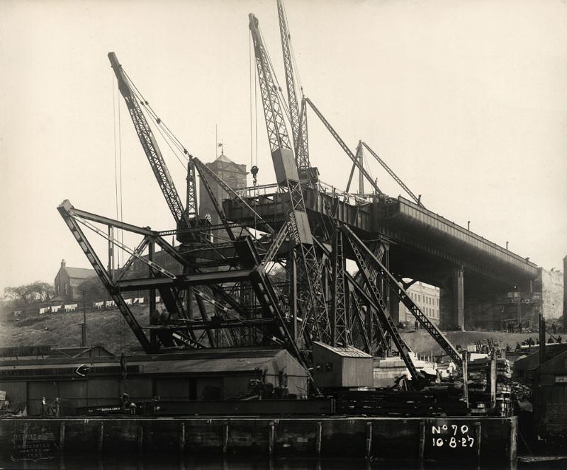 Work on the Tyne Bridge arch underway. The first sections of steelwork rise over Hillgate Quay, Gateshead, August 10, 1927