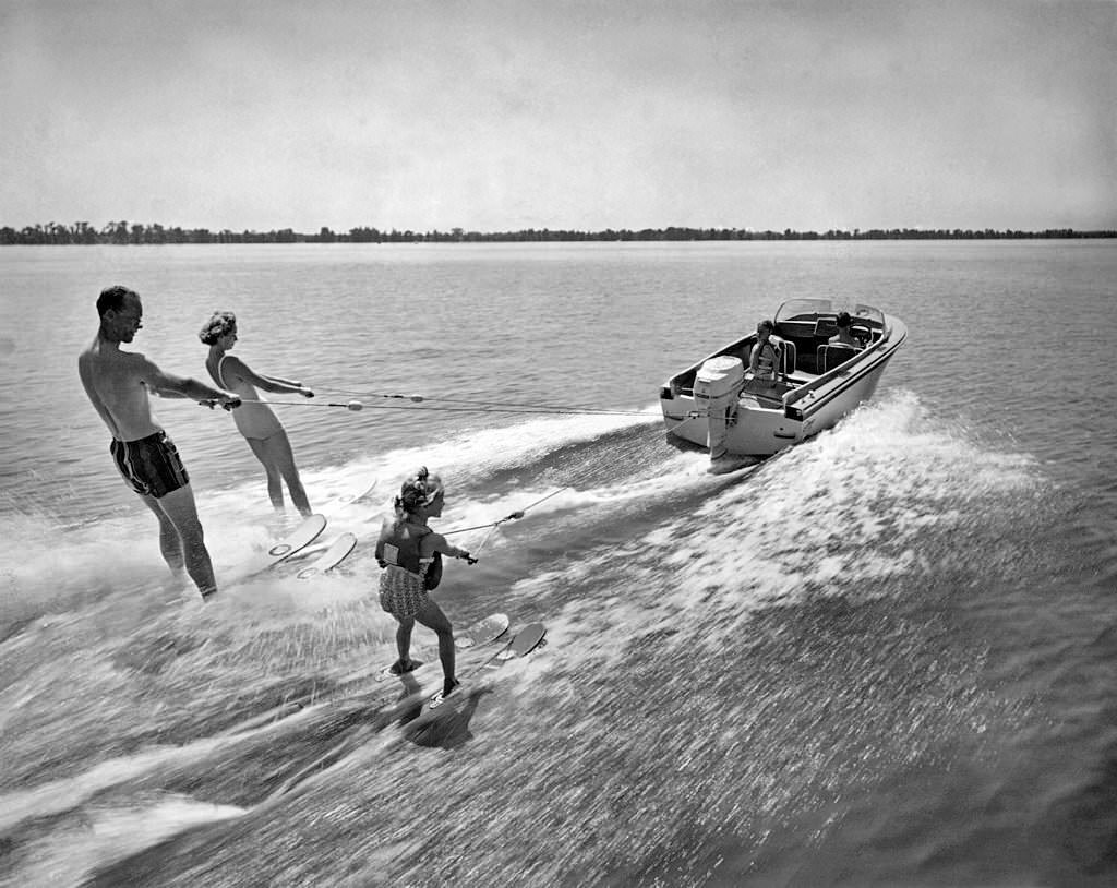The whole family enjoys water skiing behind a Johnson Super Sea-Horse 35hp motor, Cypress Gardens, Florida, 1959.