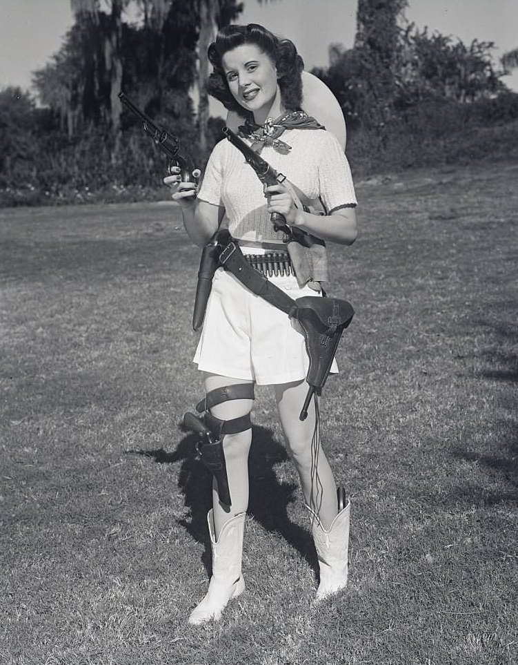 Woman in Cowgirl Outfit to Entertain, at Cypress Gardens, Florida.