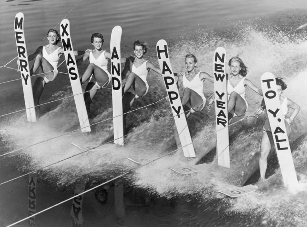 Water-skiers with a seasonal message of goodwill at Cypress Gardens, Florida, 1969