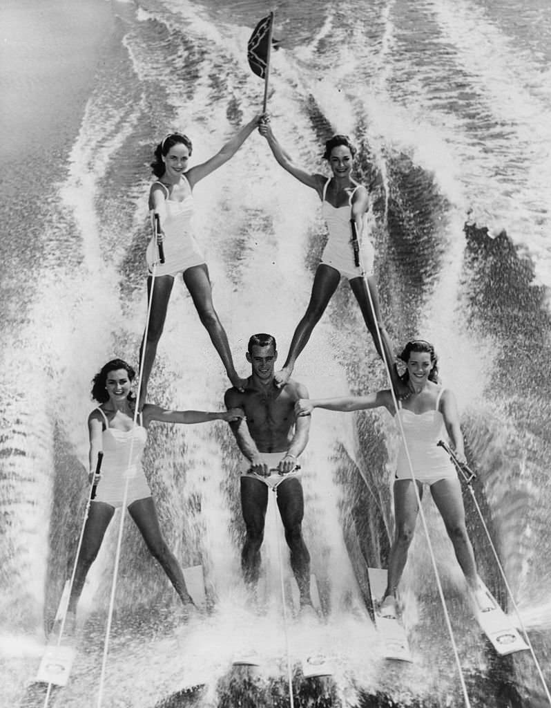 Water-ski champion Dick Pope speeds across Lake Eloise at the US Ski Centre at Cypress Gardens, Florida, flying the flag of the Southern State, 1965