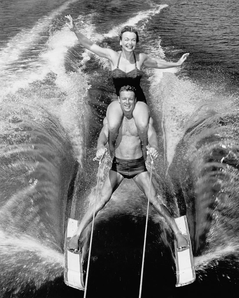 Water-ski champions Dick Pope Jr. and Jean Mason demonstrate their skills at the US Ski Centre at Cypress Gardens, Florida, 9th April 1963.