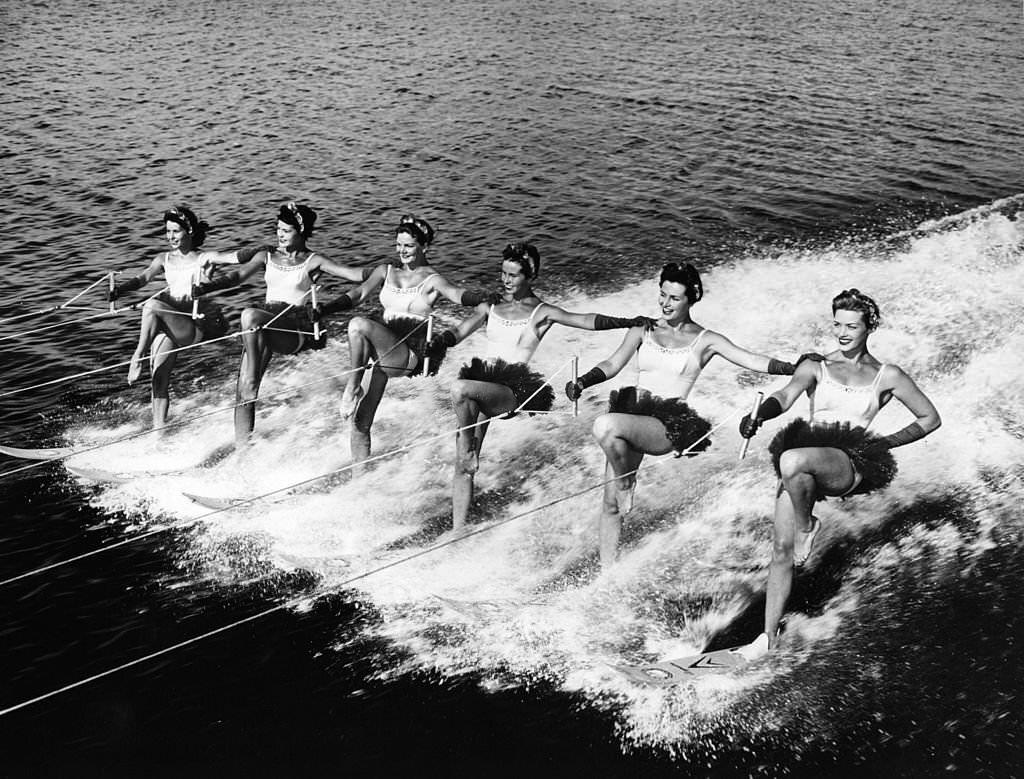 A group of women water-skiing in formation at Cypress Gardens, Florida, 1960