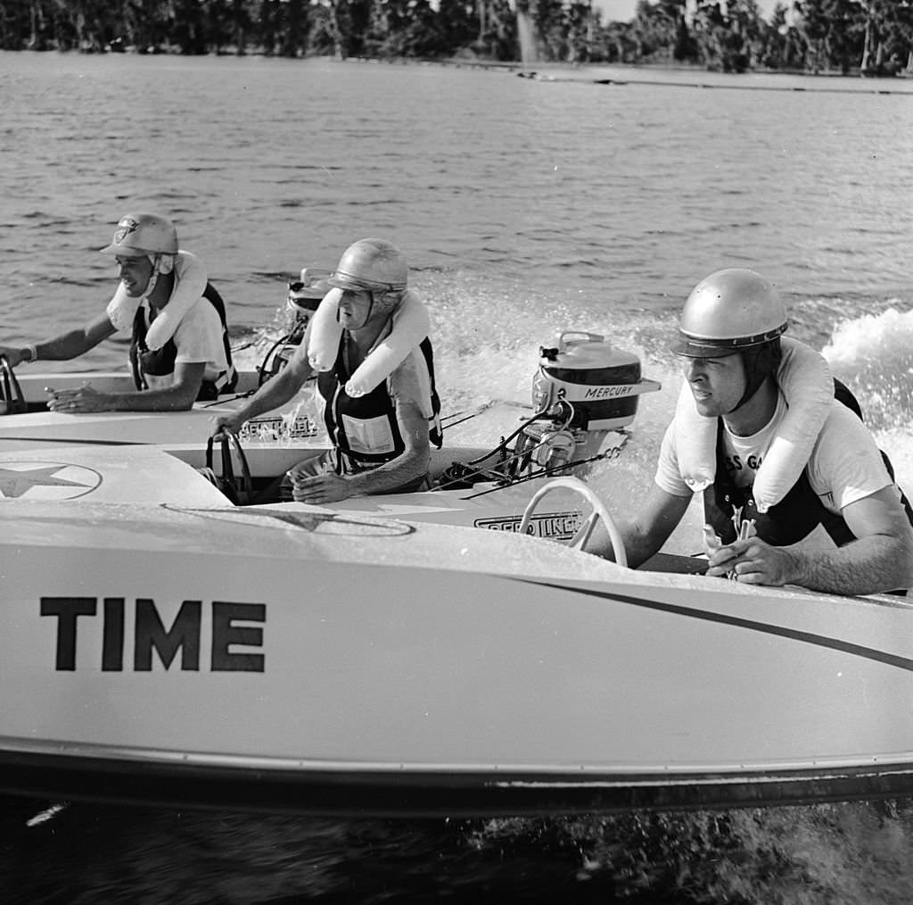 Three speedboat racers prepare to set off around the Cypress Gardens course in Florida, 1956.