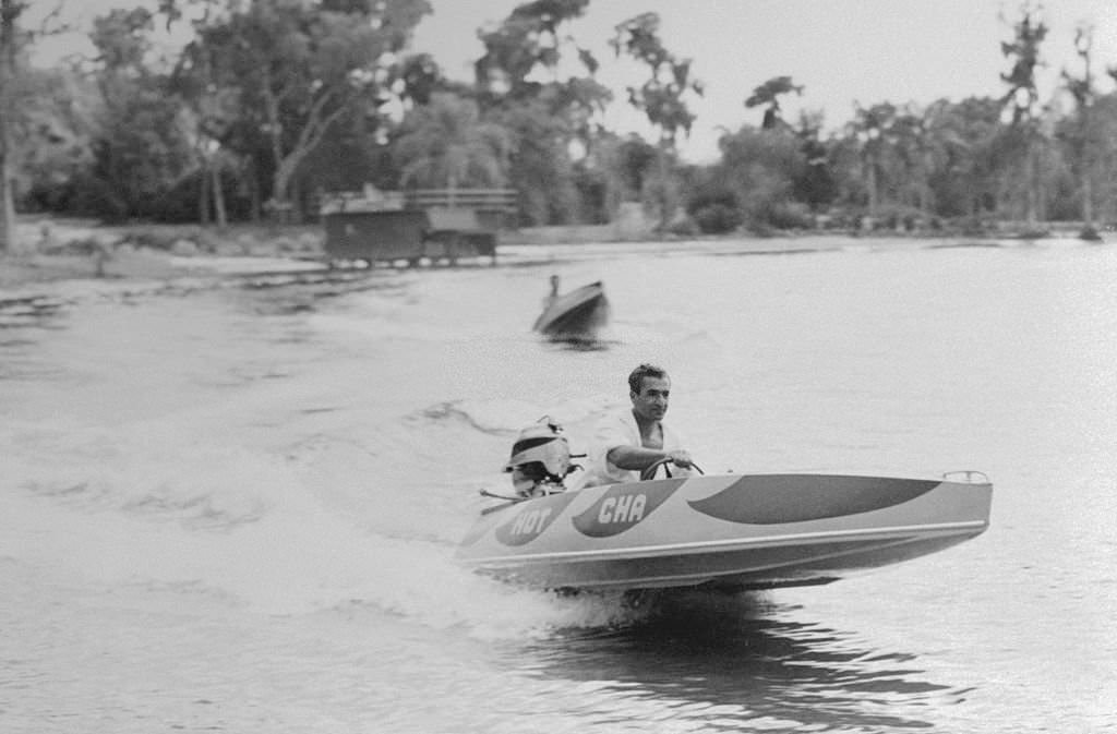 Reza Pahlevi, Shah of Iran, Driving Speedboat, 1950s
