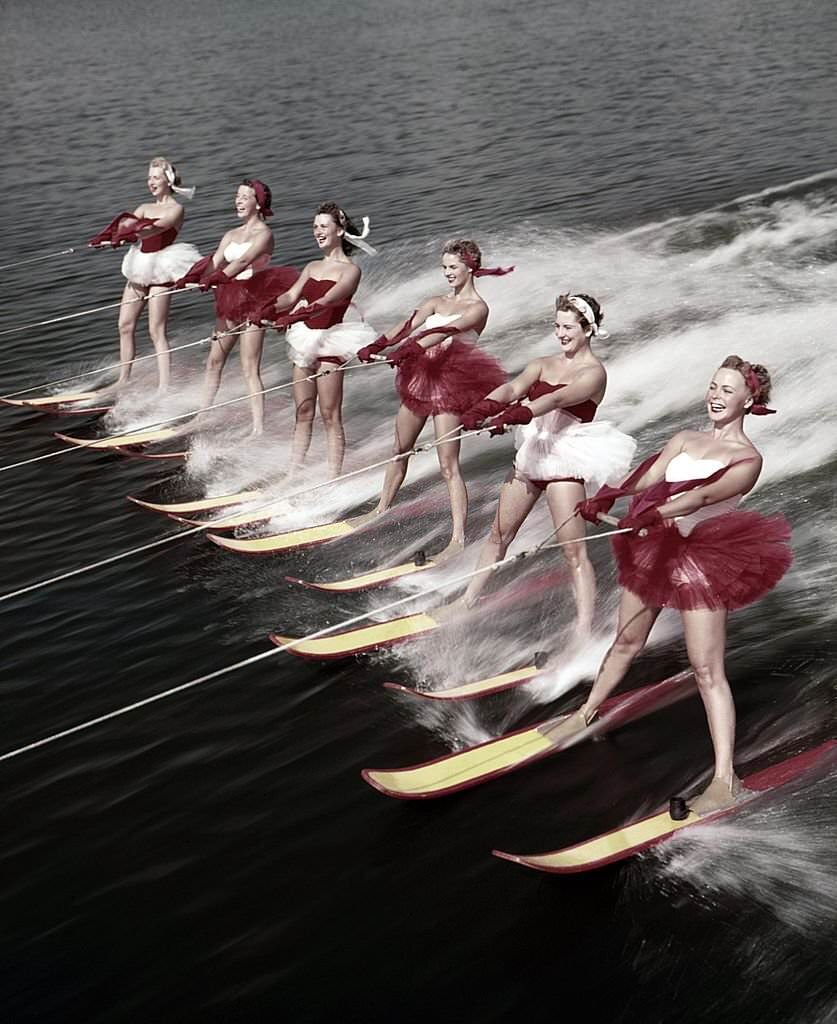 A group of acrobatic water skiers perform during a show at Cypress Gardens theme park in 1953 near Winterhaven, Florida.