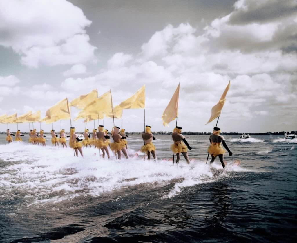 A group of acrobatic water skiers perform during a show at Cypress Gardens theme park in 1953 near Winterhaven, Florida.