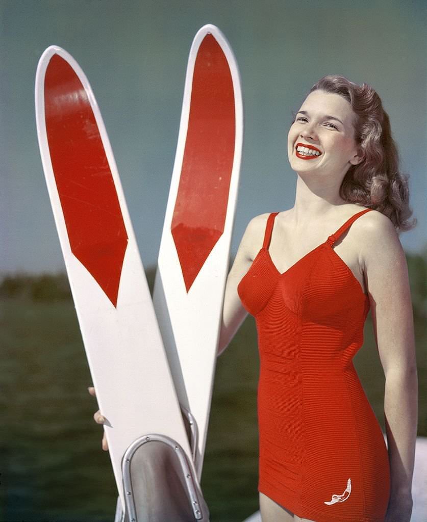 A southern belle model poses with her water skis at Cypress Gardens theme park in 1953 near Winterhaven, Florida.
