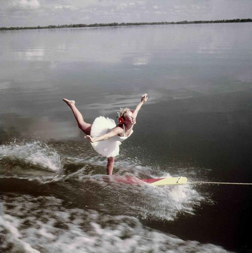 An acrobatic water skier performs during a show at Cypress Gardens theme park in 1953 near Winterhaven, Florida.