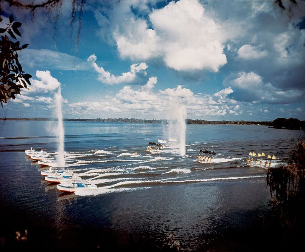 A group of acrobatic water skiers perform during a show at Cypress Gardens theme park in 1953 near Winterhaven, Florida.