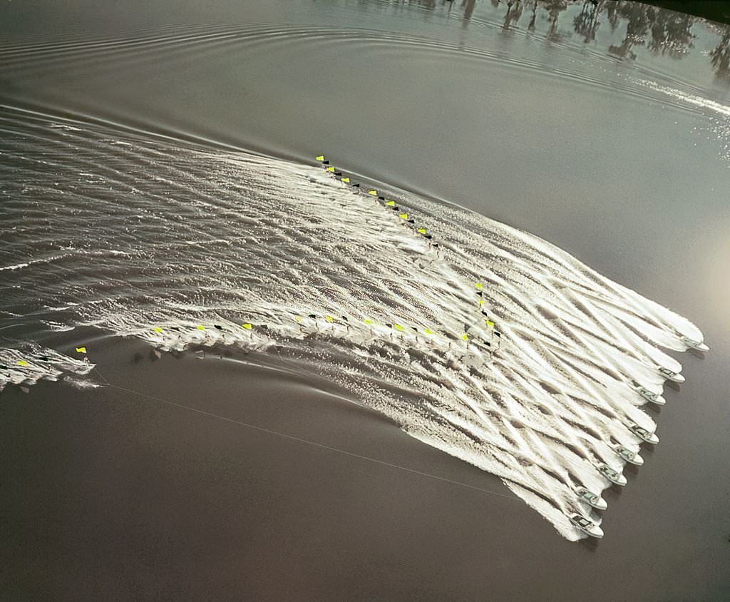 A group of acrobatic water skiers perform during a show at Cypress Gardens theme park in 1953 near Winterhaven, Florida.