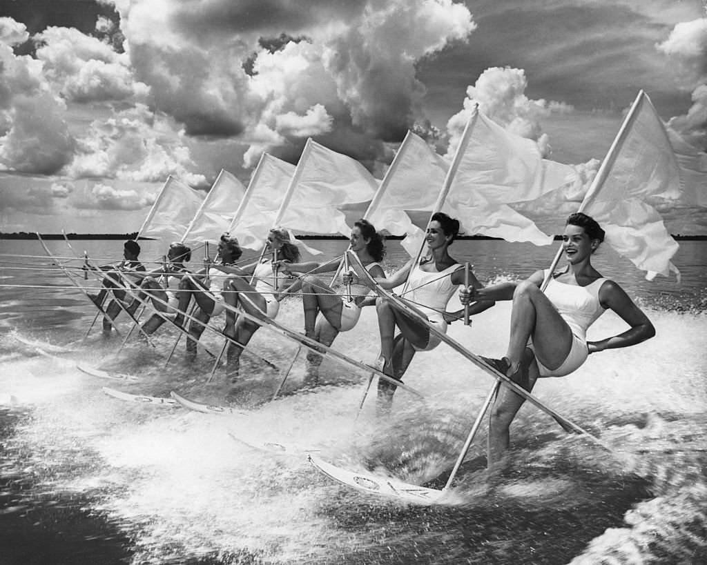 Seven Young Women Performing A One-Leg-Water-Skiing Show At The Water Ski Center In Cypress Gardens, Florida, 1950s.