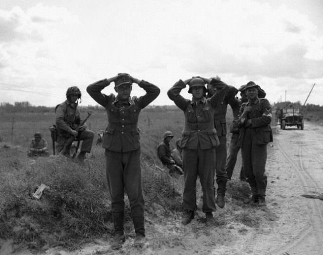 Some of the first German soldiers to surrender to the Americans during the battle of the Normandy beaches on June 9, 1944.