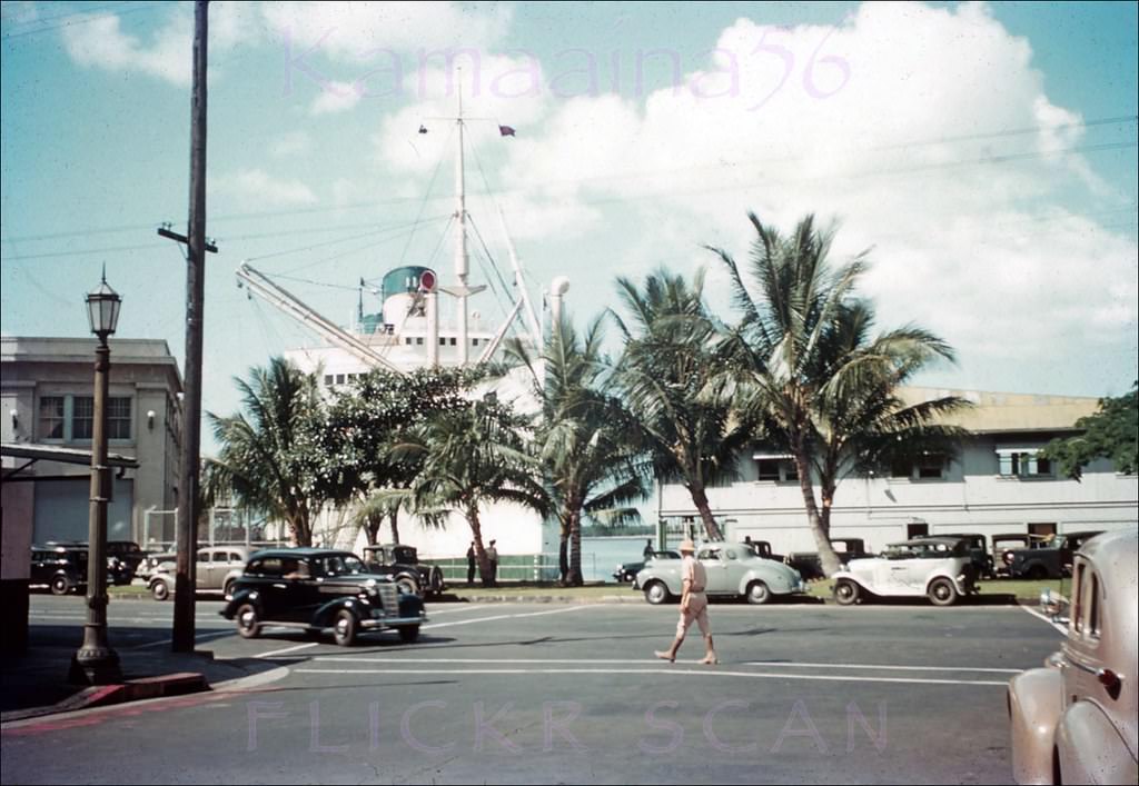 Street-level view of a Boat Day at the Matson Lines Terminal on Ala Moana Road (now Nimitz Highway) at Queen Street in downtown Honolulu, 1941