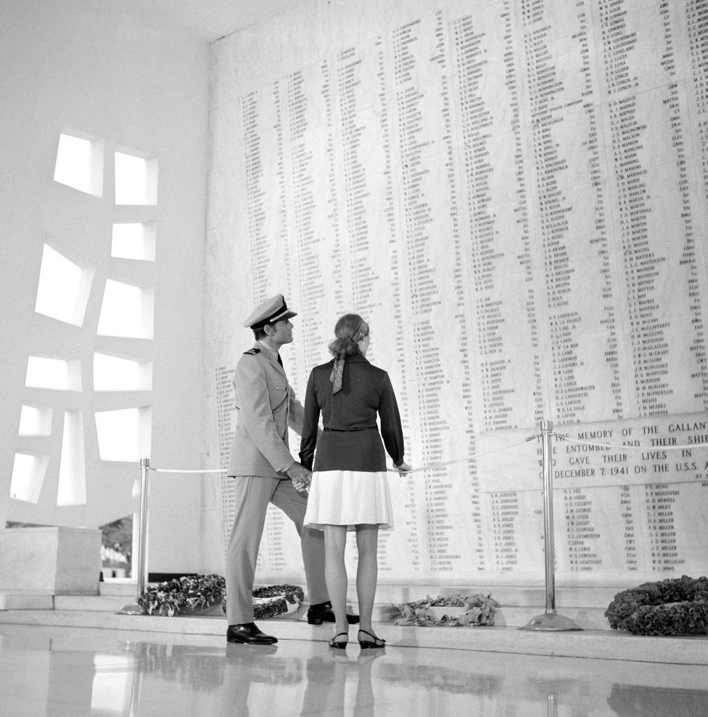 Jack Lord as Steve McGarrett and Diana Muldaur (as Cathy Wallis) on location at the USS Arizona Memorial, Pearl Harbor, HI.