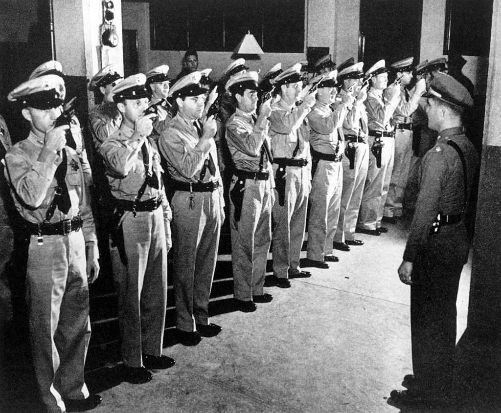 A police department on the Hawaiian island of Honolulu, formed by volunteers, practicing using guns. Honolulu, January 1942