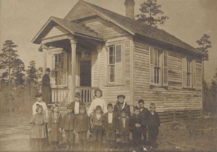Students outside a school building in rural Mobile County, 1901