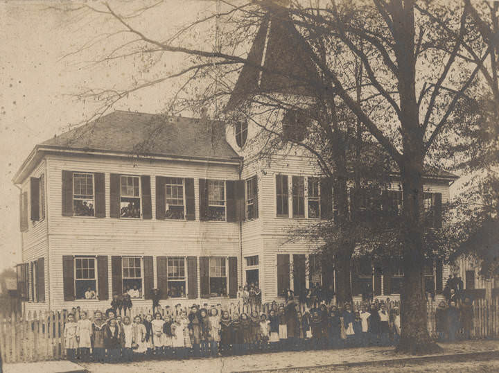 Students standing in front of the public school in Whistler, Alabama, 1902