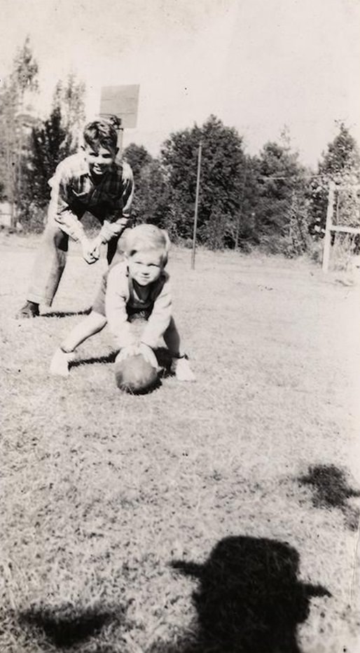 Predator: A Mysterious Man in Hat appearing in Vintage Photos Through the Decades