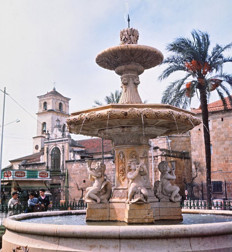 The old fountain of the “Plaza de España”, Merida, Spain, 1963.